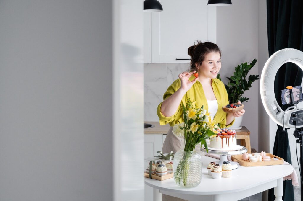 Lady recording in kitchen